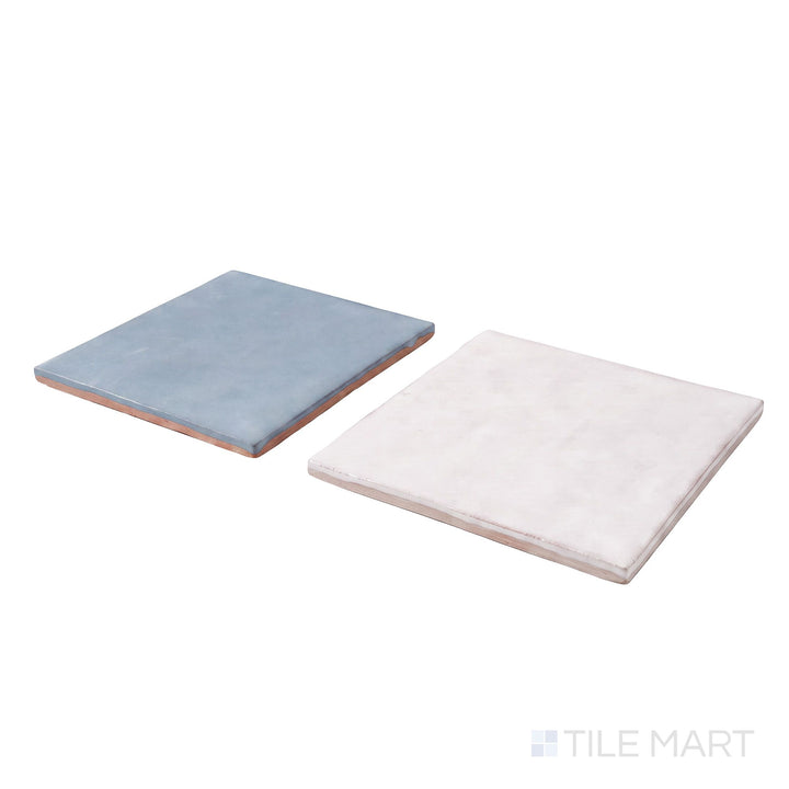 Corner shot of Melody tile in Easton White and Lyric Blue, revealing its edge profile and luminous glossy glaze.