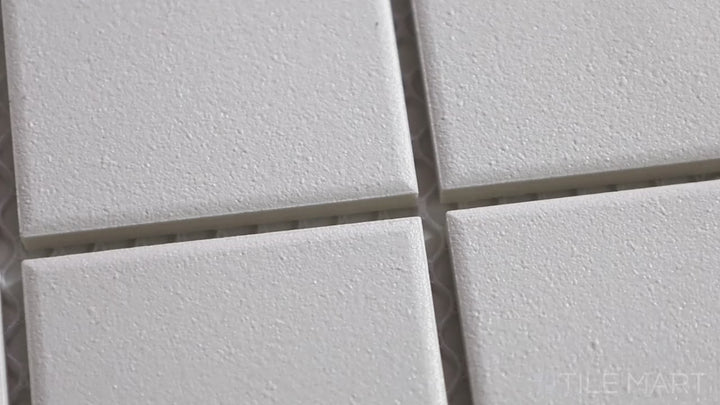Video of Solids White 2-inch Square Matte Porcelain Mosaic. A crisp white matte porcelain square mosaic, providing a classic and versatile aesthetic.