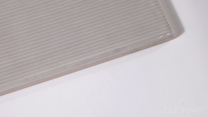 Video of Zen Greige Deco 3X12 Glossy Ceramic. A balanced blend of gray and beige with a glossy ceramic finish, bringing timeless elegance to walls and backsplashes.