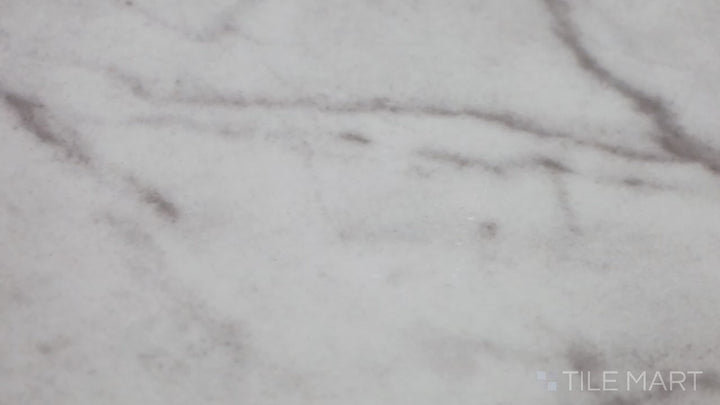 Video of Kaya Calacatta Lucca 12X24 Polished Porcelain. A luxurious high-gloss white porcelain tile featuring dramatic Calacatta-inspired veining.