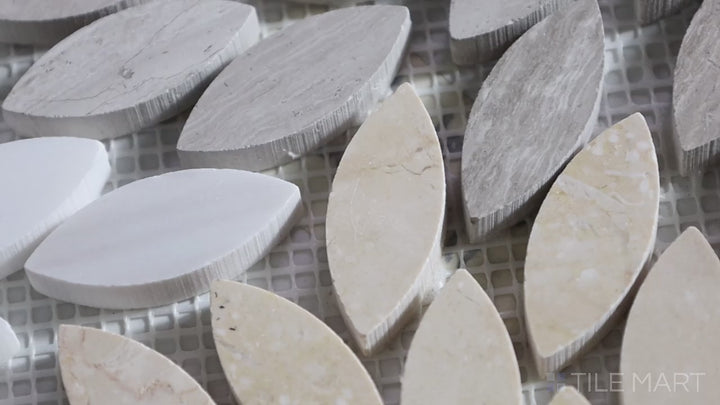 Video showcasing Sto-Re Mix D/G/W Floral Polished Marble Mosaic. A polished floral marble mosaic with a dynamic mix of dark, gray, and white tones for an elegant touch.