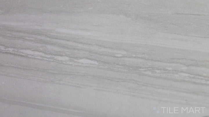 Video highlighting Demira Bianco 12X24 Polished Porcelain Tile. A luxurious white porcelain tile with a high-gloss polished finish, enhancing any elegant setting.