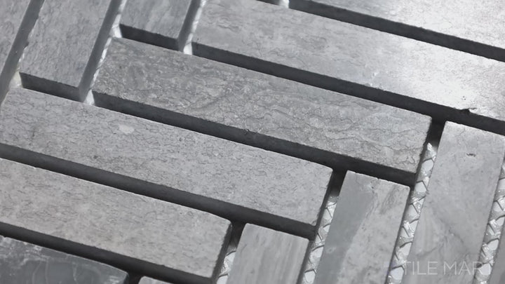 Video highlighting Sto-Re Wooden Blue Herringbone Polished Marble Mosaic. A unique Wooden Blue marble mosaic with a polished finish, featuring a herringbone design for a contemporary touch.