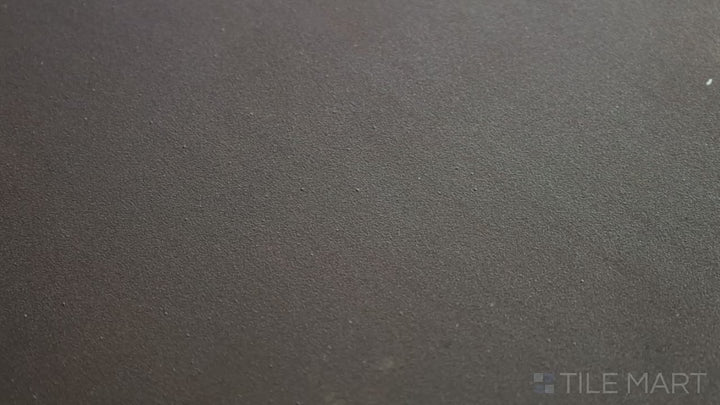 Video featuring Meraki Base Negro 8-inch Hexagon Matte Porcelain. A striking black hexagonal porcelain tile with a matte finish, delivering a dramatic and contemporary look.