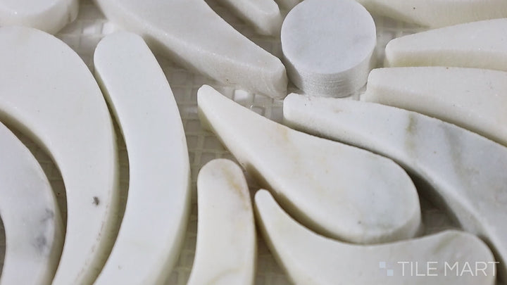 Video showcasing Lavaliere Carrara White/Antique Mirror Harlequin Polished Carrara Mosaic. A striking harlequin pattern with polished Carrara and antique mirror, ideal for luxury spaces.