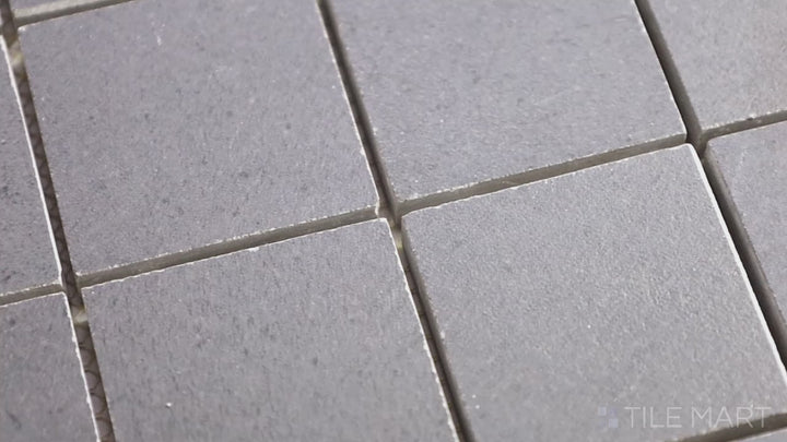 Video showcasing Urban Living Metropolis 2" Square Matte Porcelain Mosaic. A grey mosaic tile with a matte finish, adding depth and dimension to interiors.