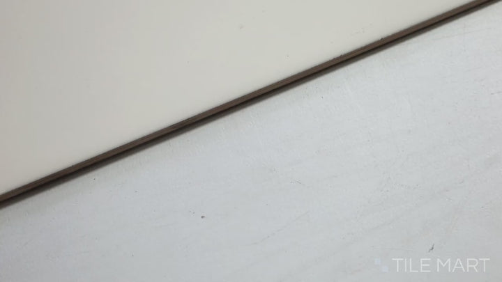 Video showcasing Domino Almond 4X16 Glossy Porcelain Bullnose. A polished almond bullnose tile that provides a seamless and finished edge to tile installations.