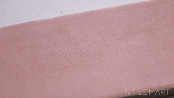 Video featuring Soco Pink 2X6 Matte Porcelain Tile. A soft pastel pink tile with a matte finish, adding a touch of charm and warmth to interiors.