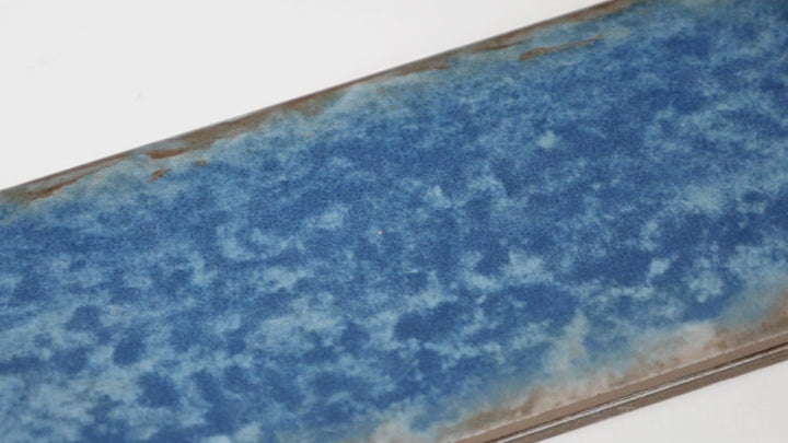 Video showcasing Organic Clay Oceanic 2X10 Matte Ceramic. A refined, muted blue tile that blends contemporary style with organic charm.