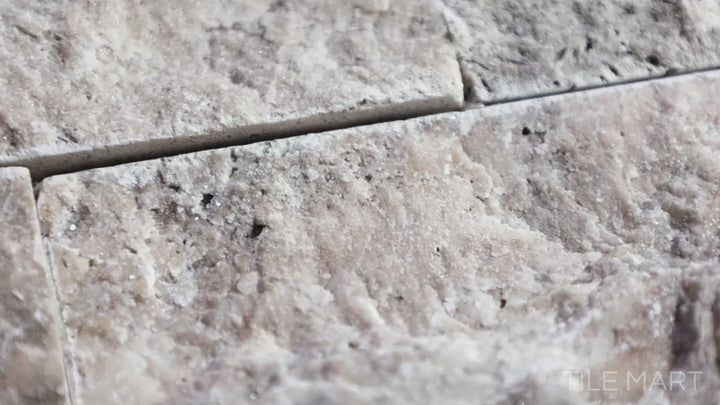 Video showcasing Rockmount Philadelphia 6X24 Stacked Stone Panel Splitface Travertine. A warm-toned travertine stacked stone panel with natural textures, ideal for rustic and modern designs.