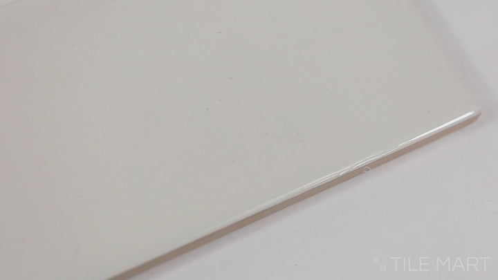 Video featuring Zen Creme 3X12 Glossy Ceramic. A soft, creamy-toned ceramic tile with a high-gloss surface, ideal for creating a serene atmosphere.