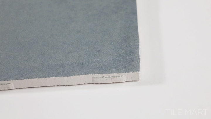 Video of Zellige Neo Cielo 4X4 Glossy Glazed Ceramic. A soft sky blue ceramic tile with a rich, glossy glaze that reflects light beautifully.