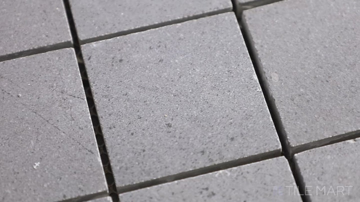Video showcasing Urban Living Titanium 2" Square Matte Porcelain Mosaic. A dark grey mosaic tile with a modern matte finish for sleek, industrial spaces.