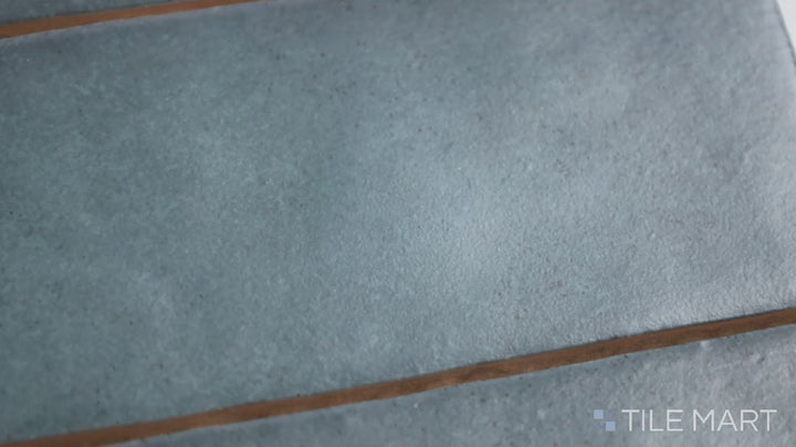 Video of Makoto Arashi Blue 2.5X10 Matte Ceramic. A deep blue ceramic tile with a matte finish, evoking the calm and sophistication of ocean hues.