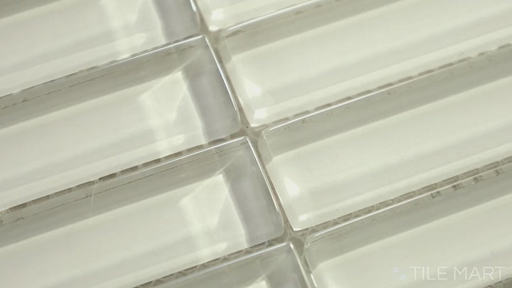 Video showcasing Glass Pastel Yellow Grid Glossy Mosaic. A soft pastel yellow glass mosaic with a high-gloss finish, arranged in a structured grid pattern for a bright and modern look.