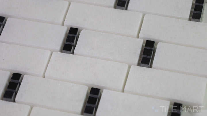 Video of The Finish Line Sable Black Subway Polished Marble Mosaic. A striking black marble subway tile with a polished finish, perfect for luxurious and dramatic interiors.