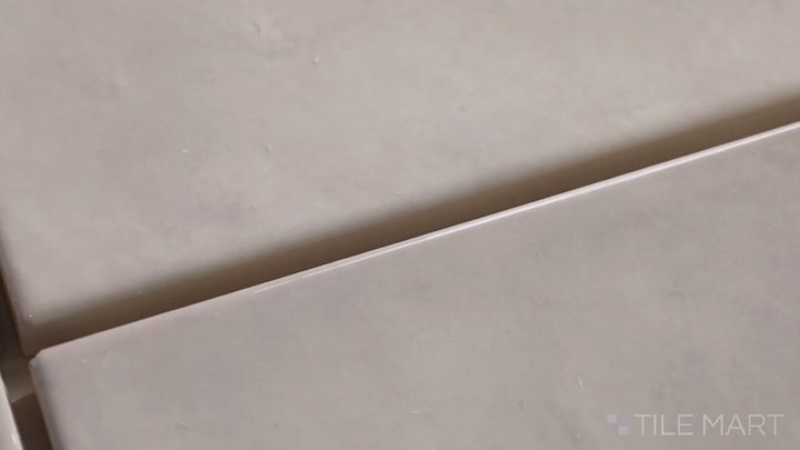 Video showcasing Village Silver Mist 5X5 Glossy Ceramic. A light silver square tile with a glossy sheen, adding subtle elegance to modern interiors.