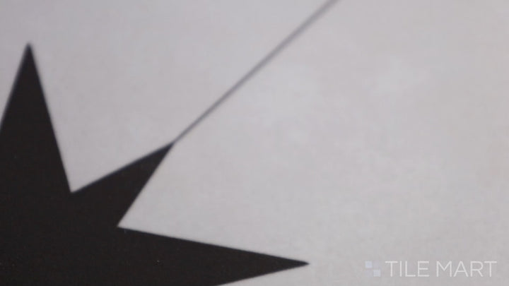 Video featuring Starburst Llevant Black 9X9 Matte Porcelain Tile. A striking black tile with contrasting white starburst designs, ideal for bold interiors.