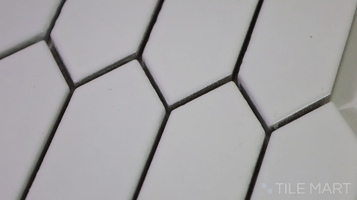 Video of Foundations Plaster Picket Fence Glossy Ceramic Mosaic. A modern ceramic mosaic with a glossy finish and picket fence pattern, creating a dynamic and elegant effect.