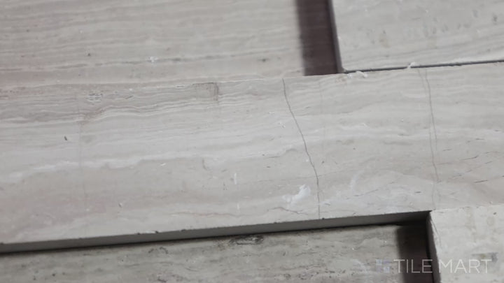 Video featuring Rockmount White Oak 4.5X16 Mini Panel Honed Marble. A sleek and elegant white marble stacked stone panel with a smooth honed surface.