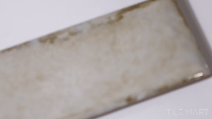 Video featuring Organic Clay Steam 2X10 Matte Ceramic. A versatile white tile with a soft matte finish, blending seamlessly into classic and modern designs.