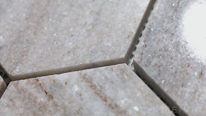 Video of Sto-Re Ocean White 2-1/2" Hexagon Polished Marble Mosaic. A clean and sophisticated Ocean White marble mosaic, featuring a polished surface and large hexagonal layout.