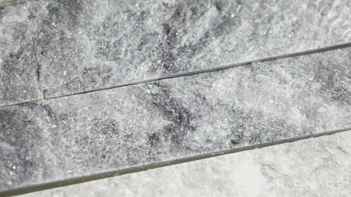 Video of Rockmount Grey 6X24 Stacked Stone Panel Splitface Marble. A versatile gray marble stacked stone panel with subtle veining and a textured finish.