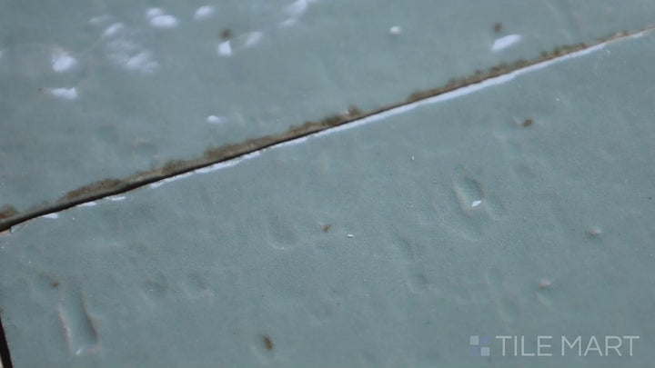 Video of Glace Turchese 3X8 Glossy Porcelain. A vibrant turquoise glossy tile that adds a bold, coastal-inspired aesthetic to walls.
