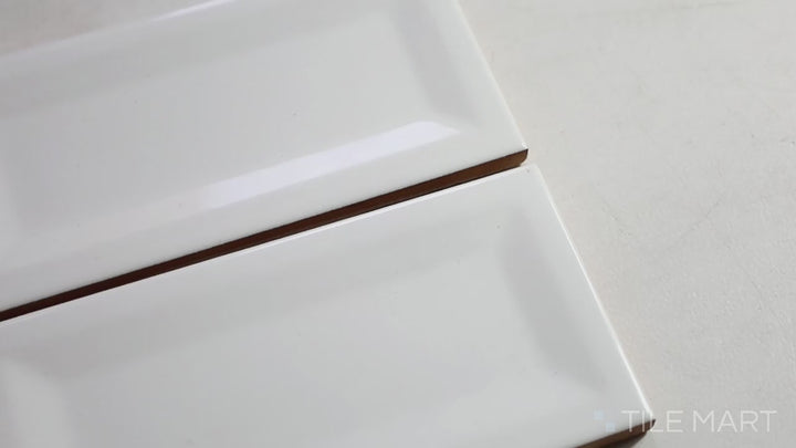 Video featuring Domino Gray 3X6 Inverted Bevel Glossy Porcelain. A stylish gray tile with an inverted bevel design for added depth and dimension.