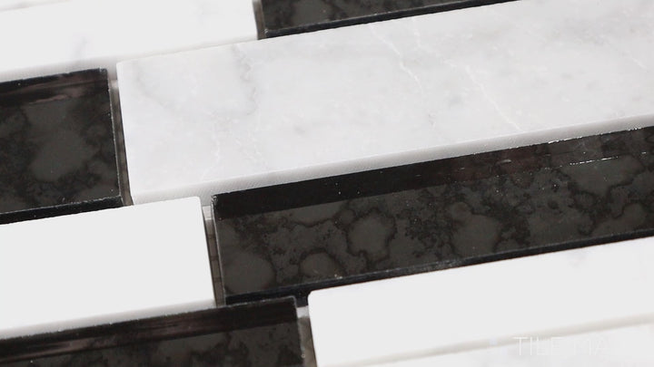 Video highlighting Lavaliere Carrara White/Bardiglio Melody Polished Carrara, Bardiglio Mosaic. A stunning mix of Carrara white and Bardiglio gray, creating a harmonious and elegant mosaic design.