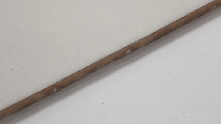 Video of Highland Lake Snow 3X10 Glossy Ceramic. A crisp white tile with a glossy finish, enhancing brightness and spaciousness in any room.