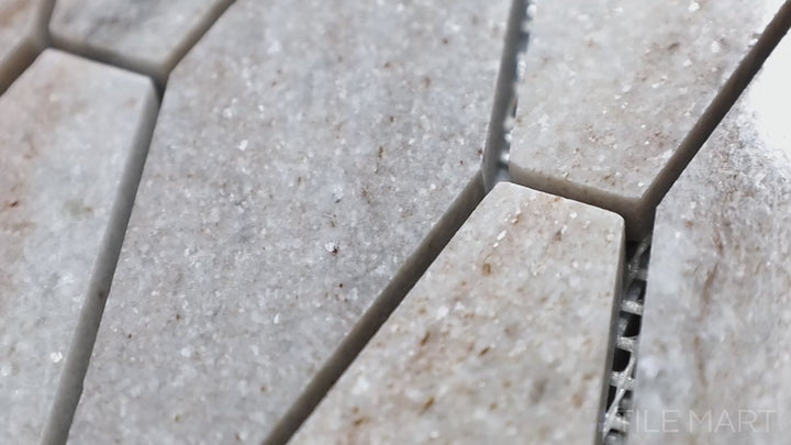 Video showcasing Sto-Re Ocean White Elongated Hexagon Polished Marble Mosaic. A modern Ocean White marble mosaic with a polished finish and elongated hexagon layout.