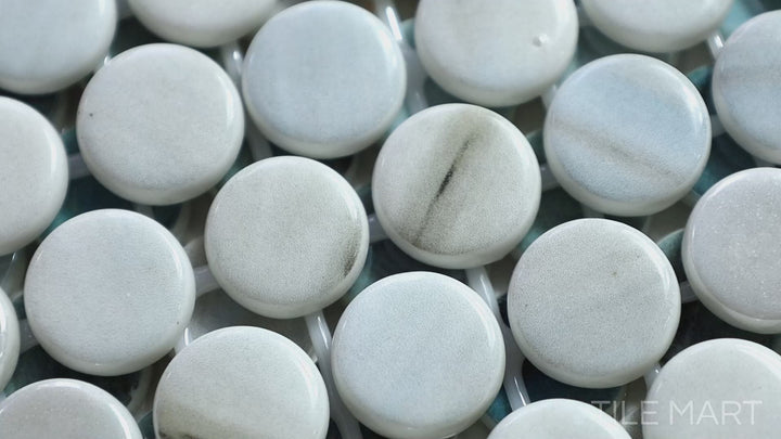 Video showcasing Onix Glass Zoe 3/4" Round Square Glossy Mosaic. A distinctive glass mosaic featuring a mix of round and square elements, perfect for dynamic and artistic wall designs.