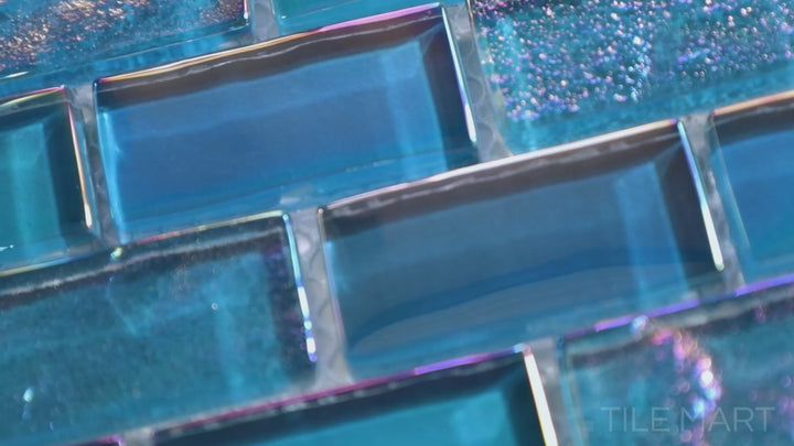 Video of Vidrofina Ocean Blue Brick Glossy Glass Mosaic. A glossy ocean-blue glass brick mosaic, offering a coastal and contemporary charm to kitchens and bathrooms.