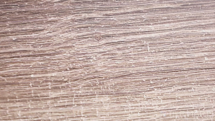 Video featuring Andover Hatfield 7X48 Low Gloss Luxury Plank Vinyl. A sophisticated wood-look vinyl plank with a refined grain, perfect for achieving a timeless aesthetic.