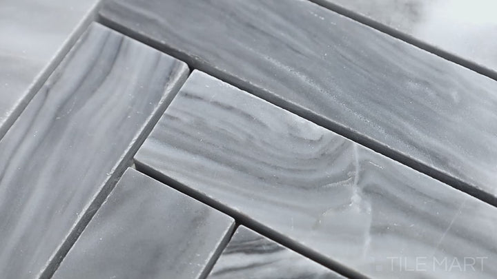Video featuring Sto-Re Bardiglio Herringbone Polished Marble Mosaic. A polished Bardiglio marble mosaic with a herringbone pattern, adding a touch of sophistication.