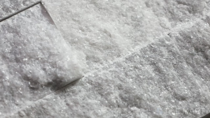 Video showcasing Rockmount Gray 6X24 Stacked Stone Panel Splitface Marble. A durable, splitface marble panel in a timeless gray shade, perfect for fireplaces and feature walls.