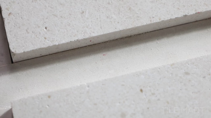 Video highlighting Modern Ledgestone Blanc 6x24 Porcelain. A clean white ledgestone porcelain tile with a structured texture, bringing a bright and refined touch.