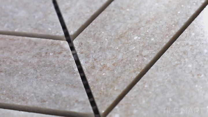 Video showcasing Sto-Re Ocean White Chevron Polished Marble Mosaic. A bright Ocean White marble mosaic featuring a chevron design, adding depth and texture.