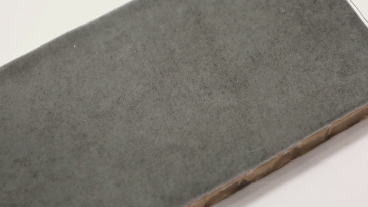 Video showcasing Highland Lake Olive 3X10 Glossy Ceramic. A rich green tile with a glossy surface, offering a natural and earthy aesthetic for walls and backsplashes.