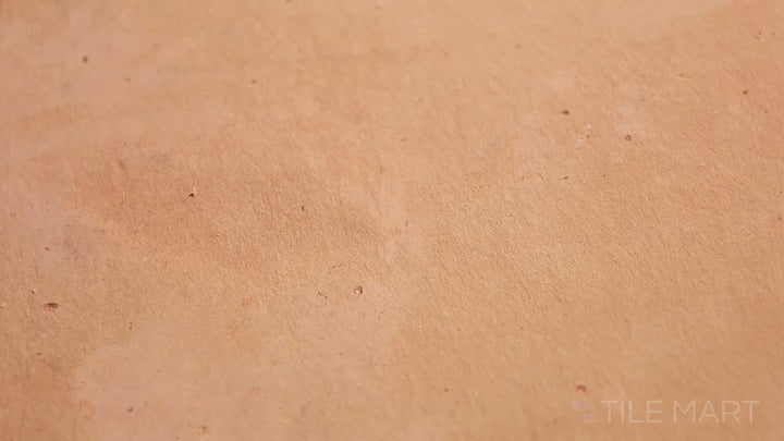 Video of Saltillo Salmon 8x8 Round Edge Natural Terracotta. A handcrafted terracotta tile with a rounded edge, providing smooth transitions for rustic flooring designs.