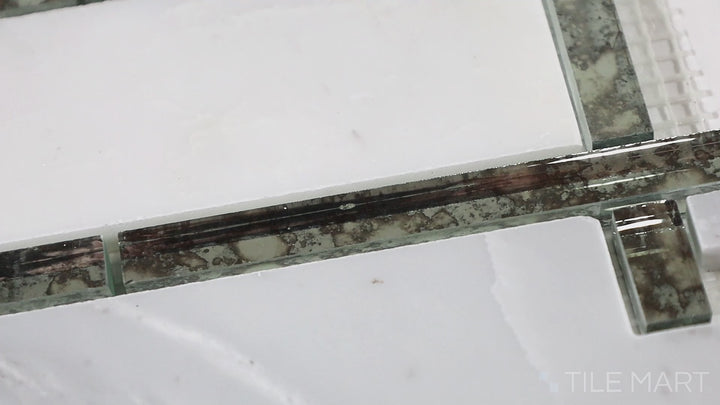 Video featuring Lavaliere First Snow Elegance/Ant Mirror Architectural Reflections Polished Marble Mosaic. A refined polished marble mosaic with intricate reflections, ideal for contemporary and classic interiors alike.