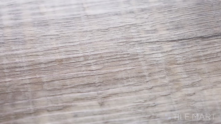 Video showcasing Cyrus Wolfeboro 7X48 Low Gloss Luxury Plank Vinyl. A versatile wood-look vinyl plank with a balance of warm and cool hues for any décor.