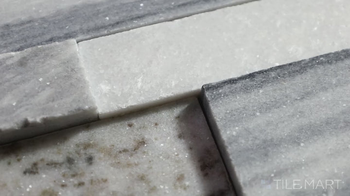 Video featuring Rockmount Cressa 6X24 Stacked Stone Panel Honed Marble. A refined honed marble panel with soft neutral tones, great for contemporary settings.