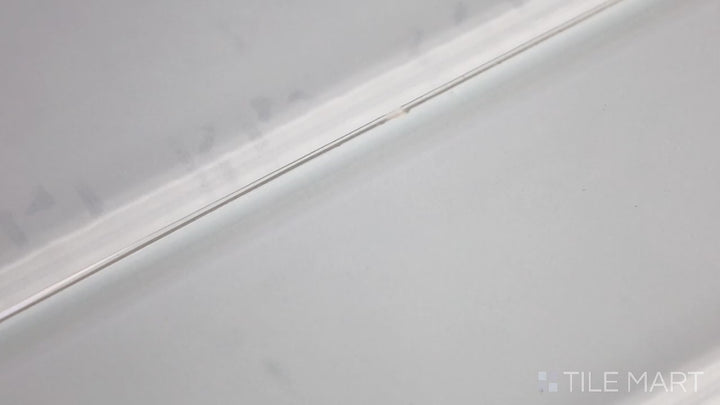 Video showcasing Glass Pastel Blue 3x12 Glossy. A soft pastel blue glass tile with a polished glossy finish, offering a sleek and modern look with a smooth, reflective surface.