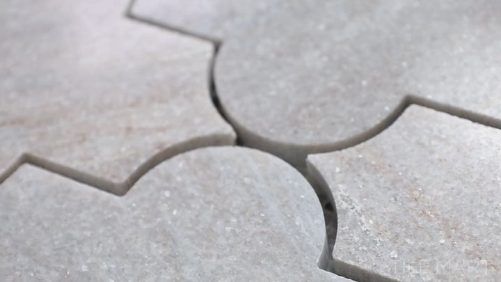 Video of Sto-Re Ocean White Marrakech Pattern Polished Marble Mosaic. A refined Ocean White marble mosaic with a polished finish, showcasing a stunning Marrakech pattern for timeless charm.