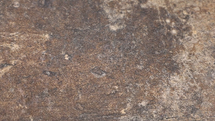 Video of Chicago State Street 4X8 Matte Porcelain. A dark, weathered brick-look tile with a matte finish, adding character and depth to walls or floors.