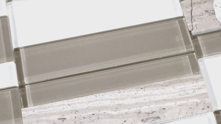 Video showcasing Simplystick Mosaix Chenille White And Glass Blend Honed Marble, Limestone Mosaic. A sophisticated mix of honed marble and glass, adding depth and elegance to interiors.