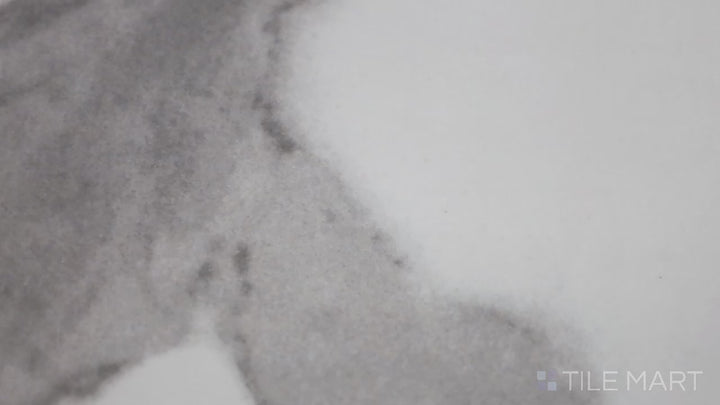 Video of Eden Statuary 12X24 Polished Porcelain. A high-gloss white porcelain tile with statuary-inspired gray veining for a luxurious effect.