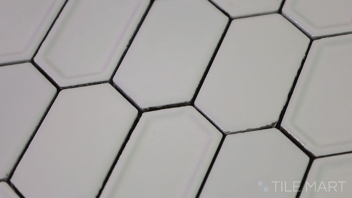 Video of Foundations Plaster Framework Inverted Bevel Glossy Ceramic Mosaic. A refined ceramic tile with a glossy surface and inverted bevel detailing, ideal for backsplashes and feature walls.